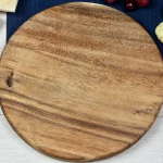 Close-up of solid walnut wood grain on handcrafted serving board