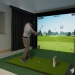Carl’s Place DIY golf simulator enclosure installed in a home golf room